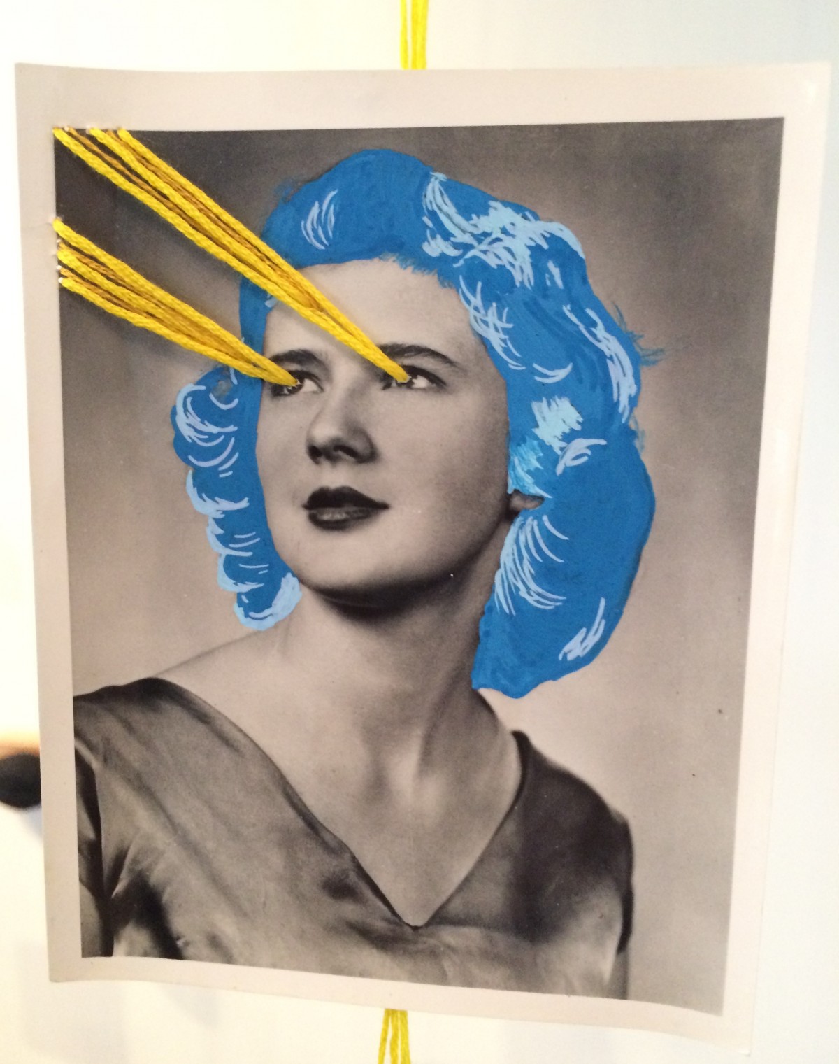 "Lady Laser Eyes" Embroidery and opaque marker on Photograph. Julianna Anderson